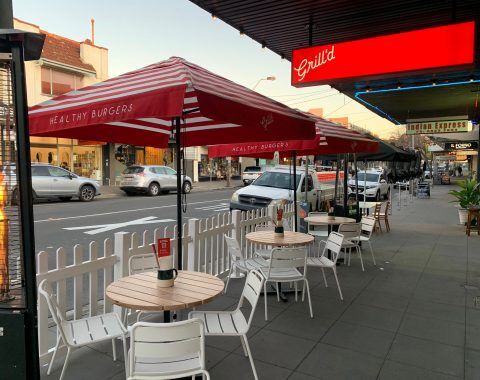 Branded cafe series umbrellas at Grill'd Hampton