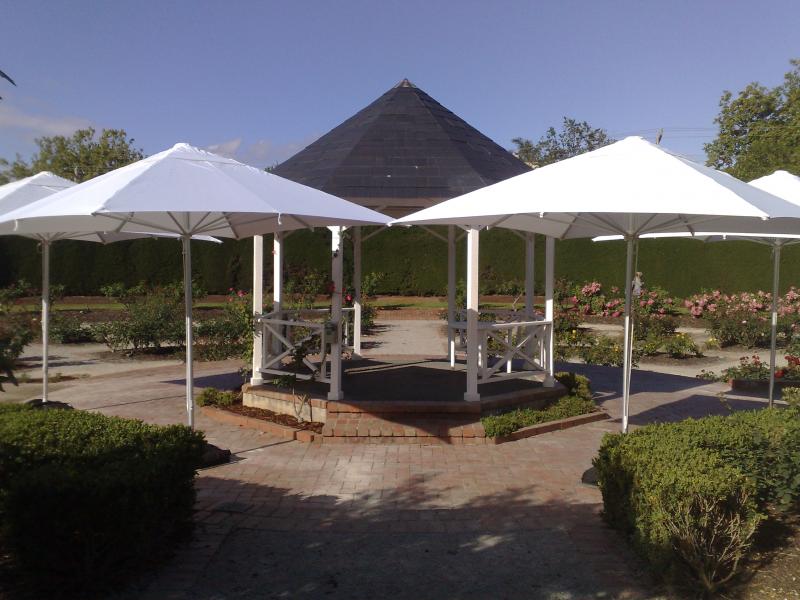 White Umbrellas with Sandbags