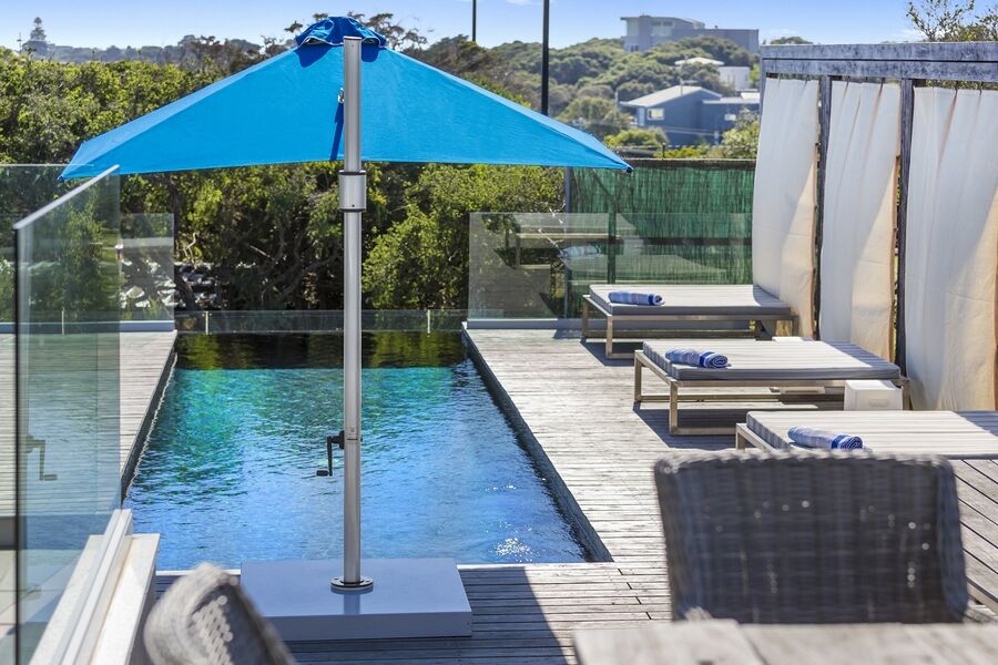 Square Cantilever Umbrella in Sailors Navy Poolside 1